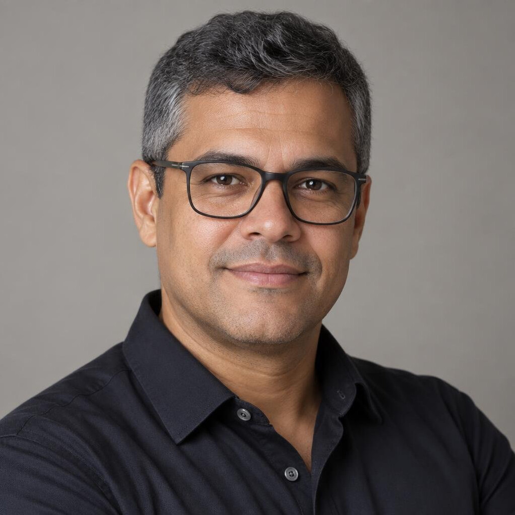 Portrait of a Brazilian man editorial writer with glasses